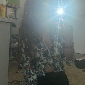 Floral blouse that ties in the front.